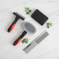 Furora Shedding Control Bundle - undercoat rake, slicker brush, hair removal brush and grooming comb flatlay