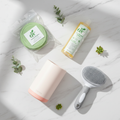 Furora Complete Pet Care Bundle - pet wipes, paw cleaner, ear cleaning drops and hair removal brush flatlay